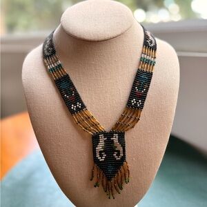 Elegant handwoven Beaded Necklace with Gold and Black Details, Nautical inspired